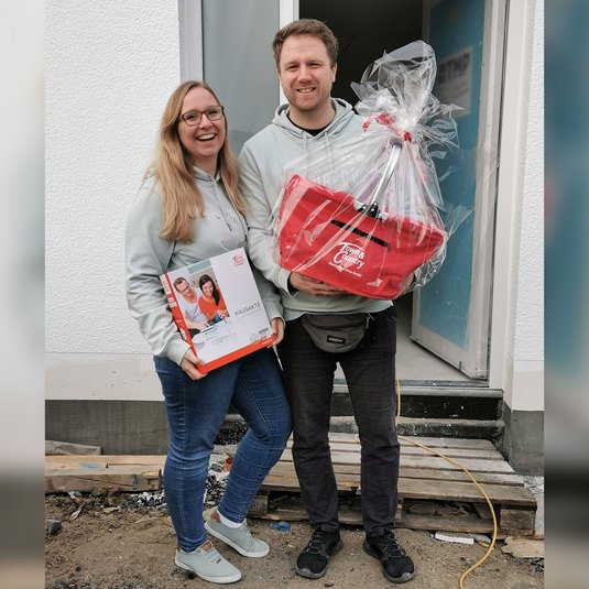 Schlüsselübergabe für ein traumhaftes Haus