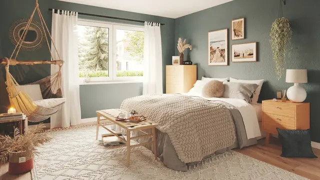 Das Bild zeigt ein stilvolles Boxspringbett im Schlafzimmer – ideale Kombination aus Ergonomie, Komfort und hochwertigem Design.